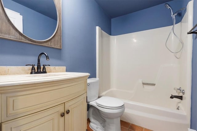 full bathroom featuring tile patterned floors, vanity, bathtub / shower combination, and toilet