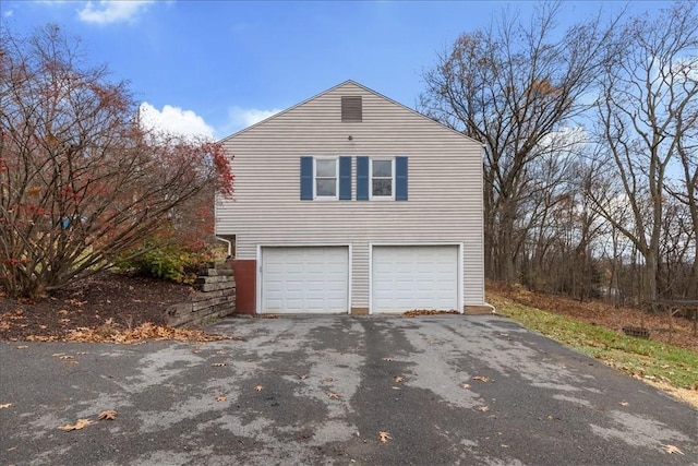 view of home's exterior featuring a garage