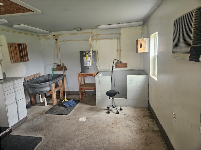 basement featuring electric water heater