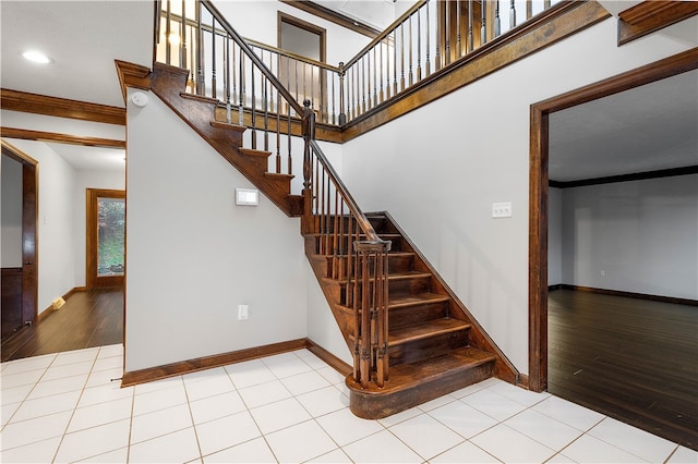 staircase featuring hardwood / wood-style floors