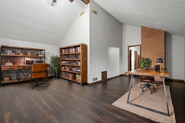 office area featuring ceiling fan, high vaulted ceiling, dark wood-type flooring, and a textured ceiling