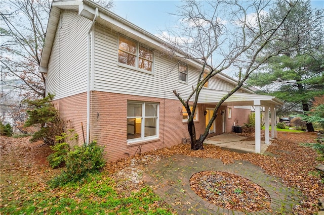 exterior space featuring a patio area and central AC unit