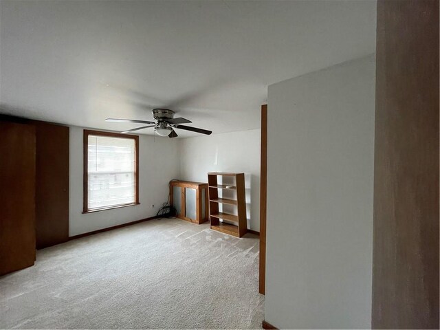 306 E Main St, Ligonier Boro, PA 15658 - additional living space with ceiling fan, light carpet, and baseboards