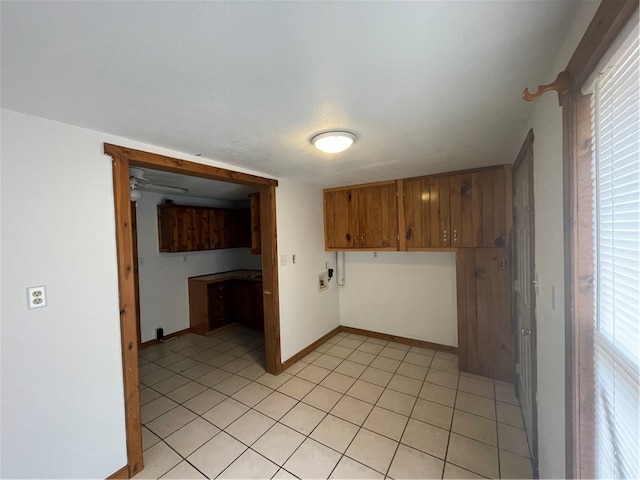 kitchen with light tile patterned floors