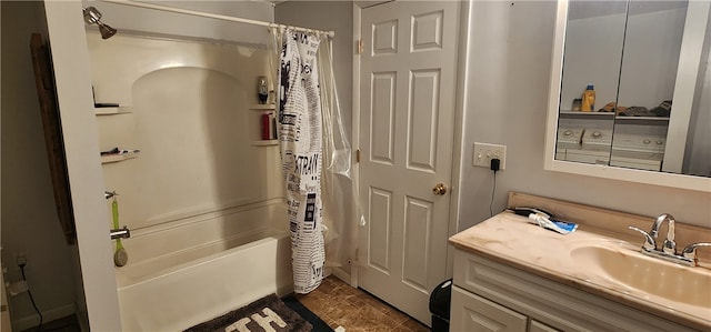 bathroom with shower / bath combo with shower curtain and vanity