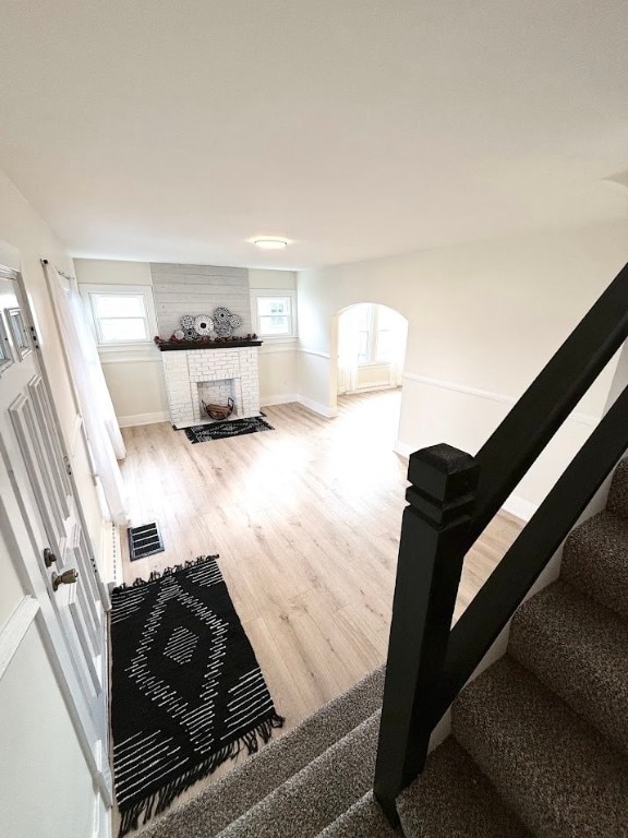 interior space featuring hardwood / wood-style flooring and plenty of natural light