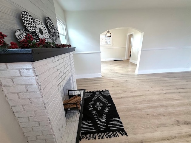 corridor featuring hardwood / wood-style flooring