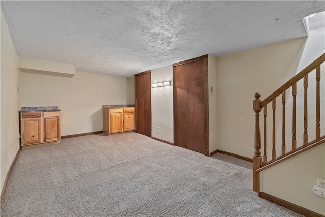 interior space with a textured ceiling