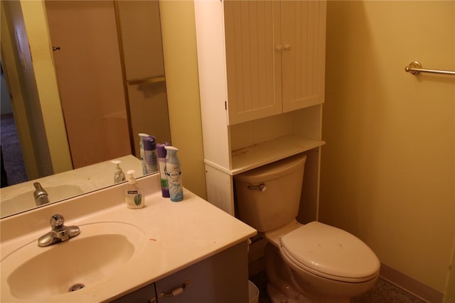 bathroom with toilet and sink