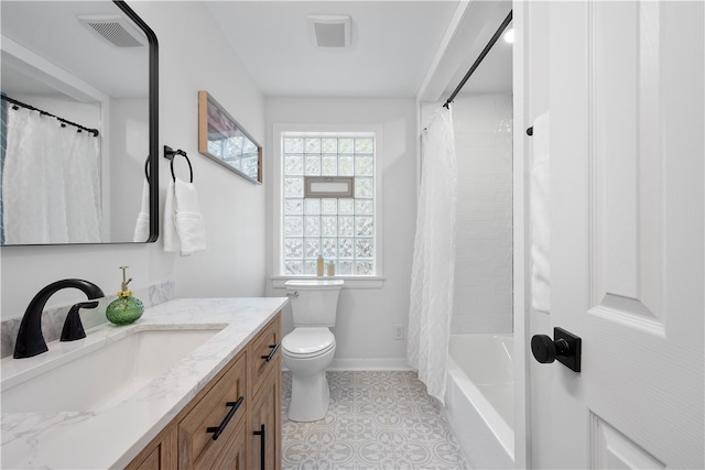 full bathroom featuring vanity, toilet, and shower / bath combo