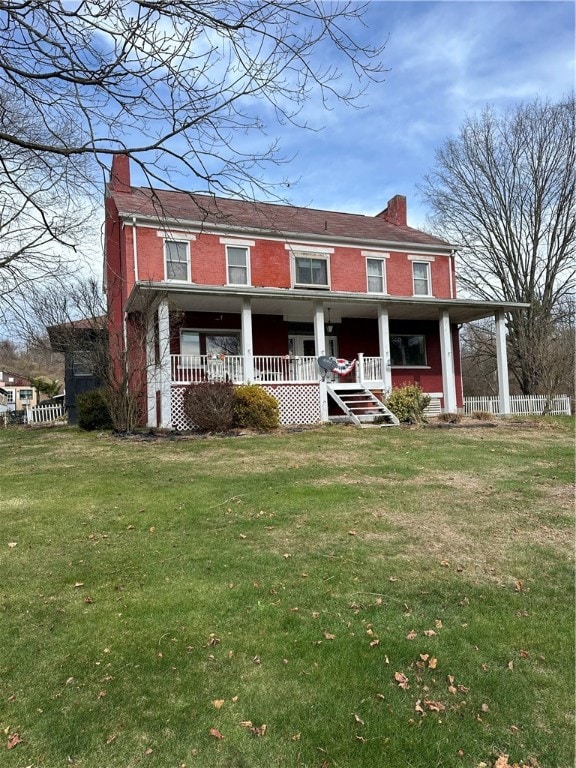 view of front of home featuring a porch and a front yard