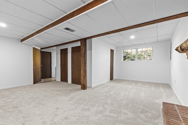 basement featuring carpet flooring