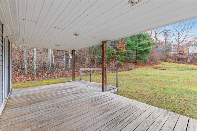 wooden deck with a yard