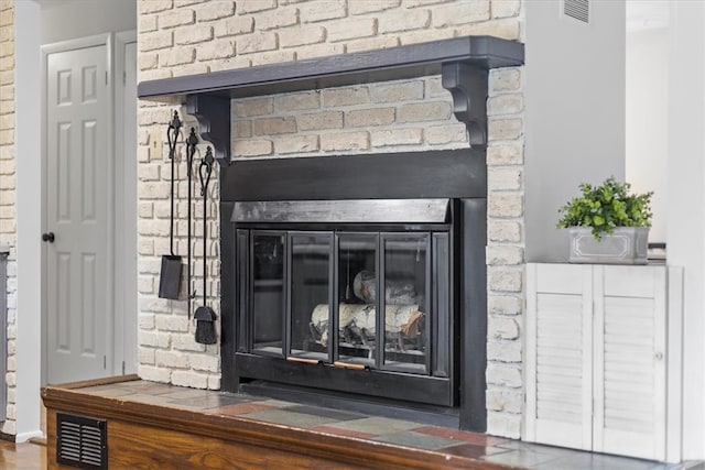 details with a brick fireplace