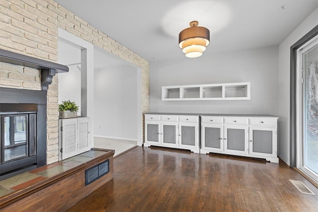 interior space with dark wood-type flooring