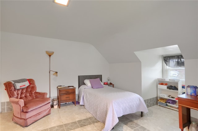 bedroom with vaulted ceiling