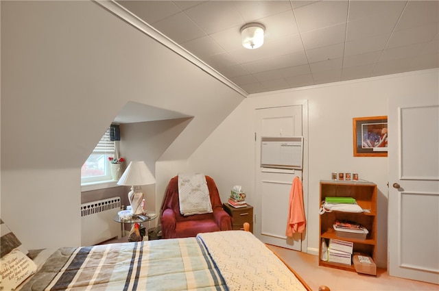 bedroom featuring radiator and ornamental molding