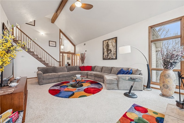 carpeted living room featuring beamed ceiling, ceiling fan, and high vaulted ceiling