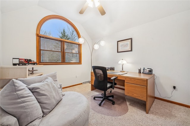 home office with light carpet, ceiling fan, and lofted ceiling