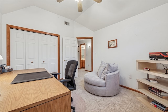 carpeted home office featuring ceiling fan and lofted ceiling