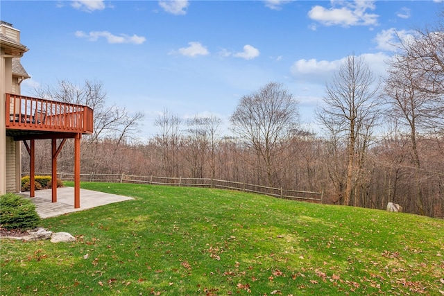 view of yard featuring a patio area and a deck