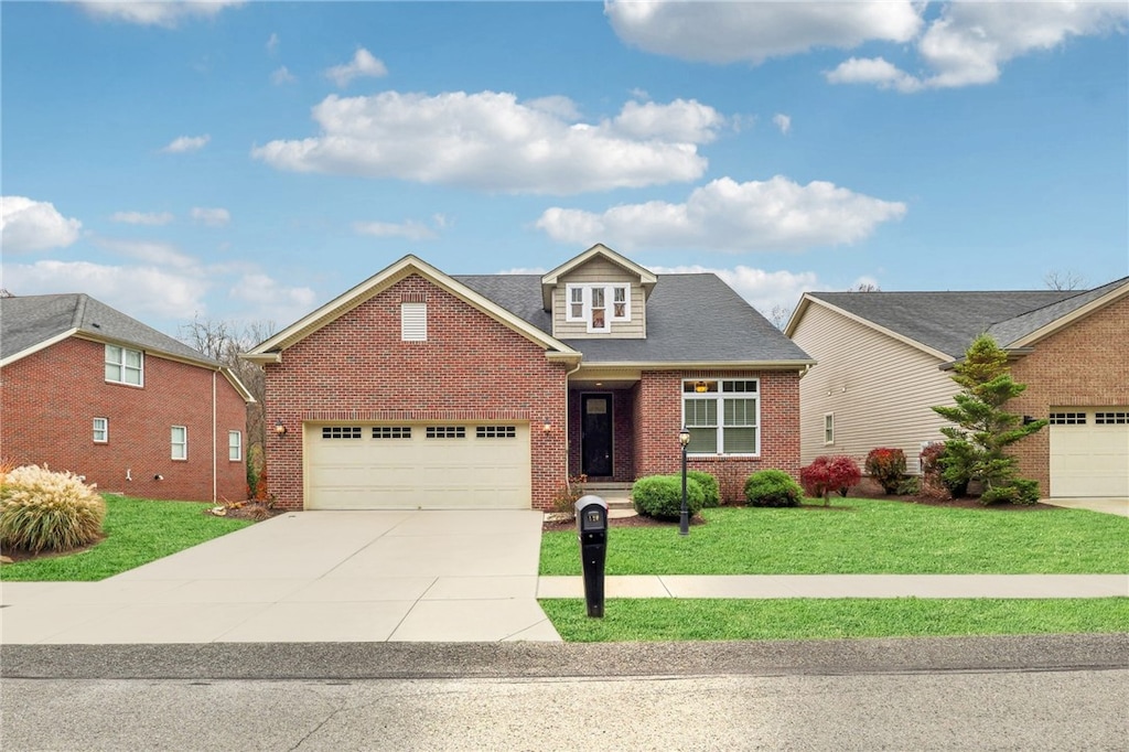 view of front facade featuring a front lawn and a garage