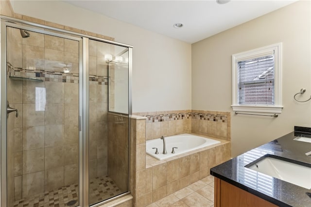 bathroom featuring tile patterned flooring, vanity, and independent shower and bath