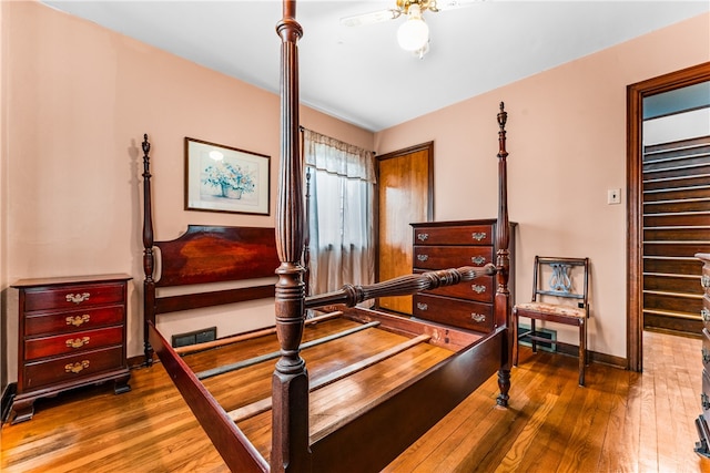 bedroom featuring hardwood / wood-style floors