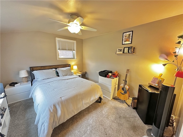 bedroom featuring carpet, ceiling fan, and lofted ceiling