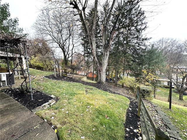 view of yard with central AC unit