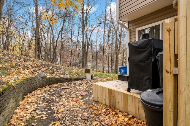 view of yard featuring a wooden deck