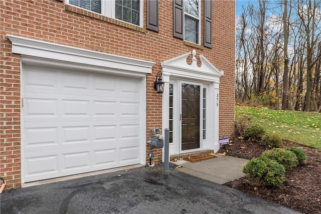 property entrance featuring a garage