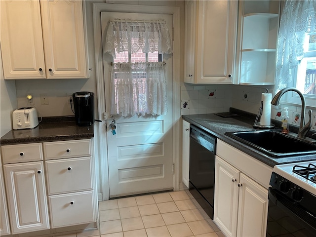 kitchen with sink, tasteful backsplash, white cabinets, light tile patterned flooring, and black appliances