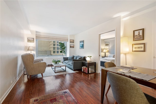 living room with dark wood-type flooring