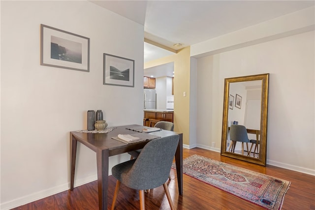 home office featuring hardwood / wood-style flooring