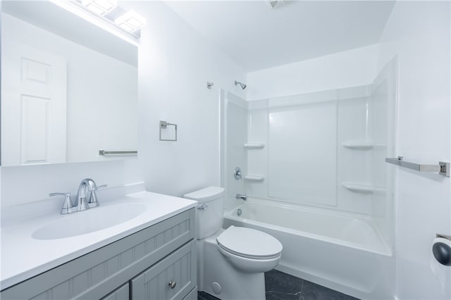 full bathroom featuring tile patterned floors, vanity, bathtub / shower combination, and toilet