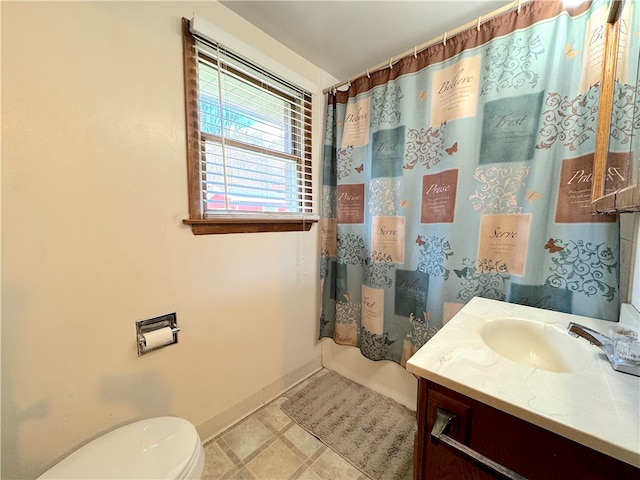 full bathroom with tile patterned flooring, vanity, toilet, and shower / tub combo with curtain