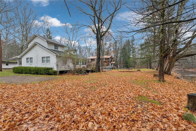 view of yard featuring a deck