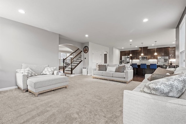 living room with light colored carpet