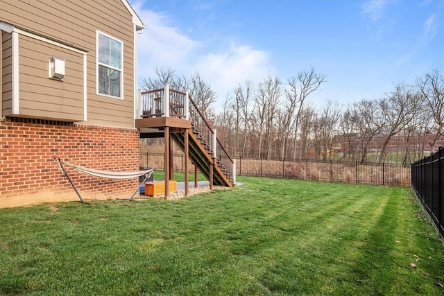 view of yard featuring a wooden deck