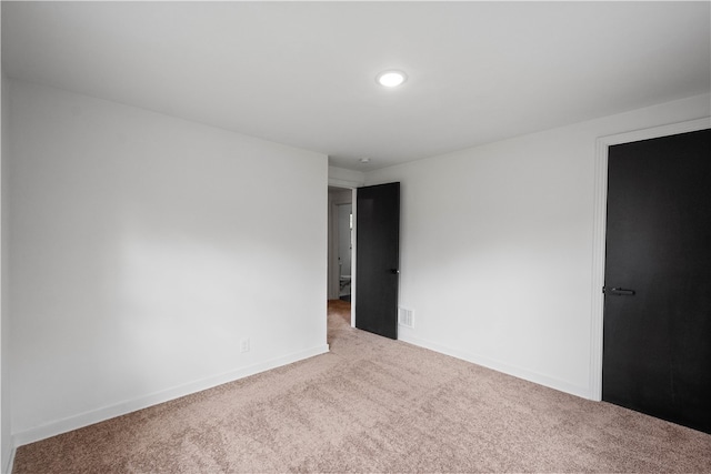 spare room with carpet flooring