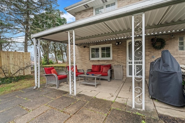 view of patio with an outdoor hangout area and a grill