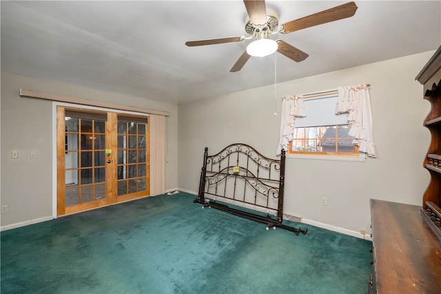 unfurnished bedroom featuring french doors and dark carpet