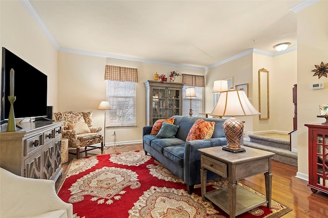 living room with crown molding and hardwood / wood-style flooring