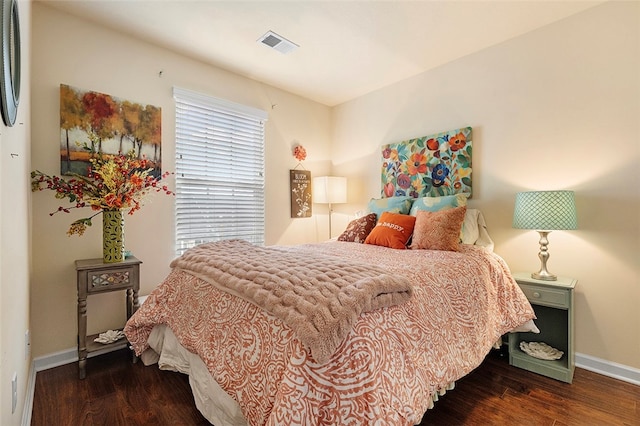 bedroom featuring dark wood-type flooring