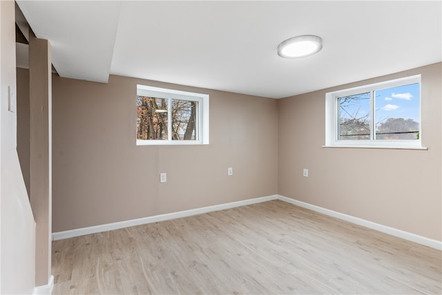 basement with light wood-type flooring