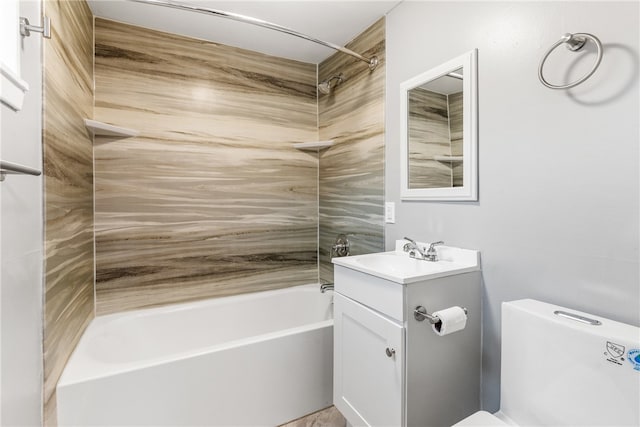 full bathroom featuring vanity, toilet, and tiled shower / bath