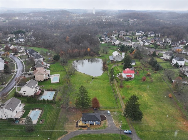 drone / aerial view featuring a water view