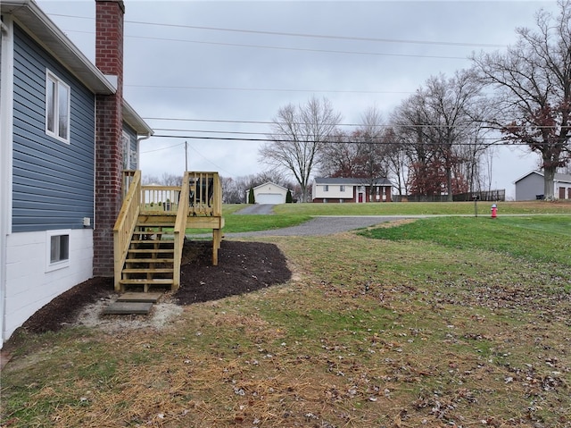 view of yard with a wooden deck