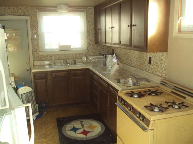 331 W Main, Somerset Boro, PA 15501 - kitchen featuring white range with gas stovetop and light countertops